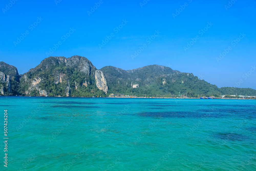 Blue lagoons of the Phi Phi archipelago in Thailand, horizontal image with copy space for text