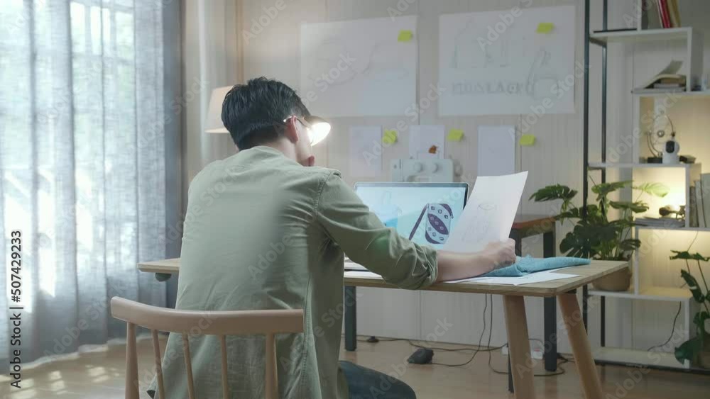 Back View Of A Man Bag Designer With Fabric Looking At The Layout Bond While Using Laptop For Designing Bags At The Office
Back View Of A Man Bag Designer With Fabric Looking At The Layout Bond While Using Laptop For Designing Bags At The Office