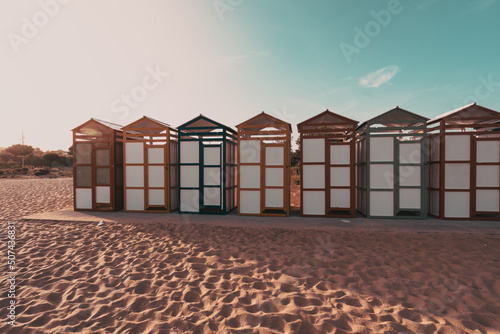 Famous beach huts in Sagaro with Playa de Sant Pol, Costa Brava. Spain. Mediterranean Sea photo