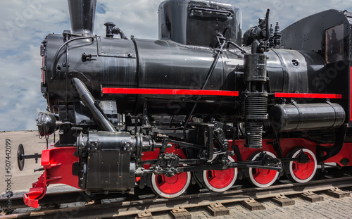 Vintage antique steam locomotive or train engine