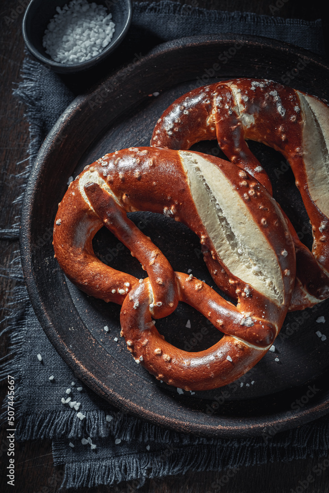 Homemade and crispy pretzels with salt freshly baked at home. Homemade and crispy pretzels with salt freshly baked at home.