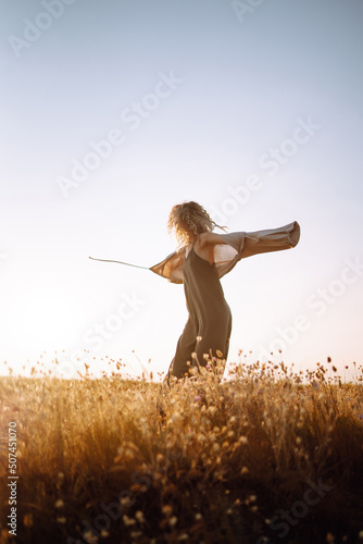 Young woman resting in nature. People, lifestyle, relaxation and vacations concept. Fashion, style concept.