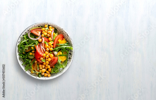 Summer healthy vegetables salad with cucumber, chickpeas and tomato. Healthy food.Top view.