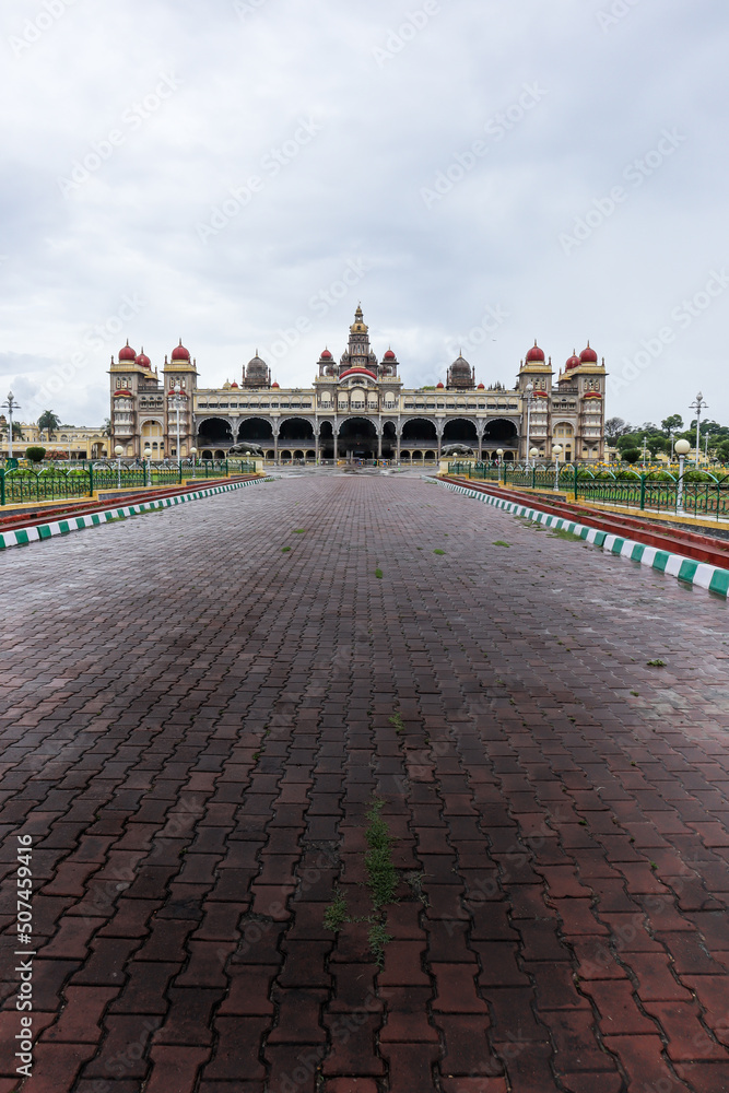 A Far view of the classic Royal Amba Vilas palace which is a famous tourist destination on a monsoon overcast morning in Mysore, India.
