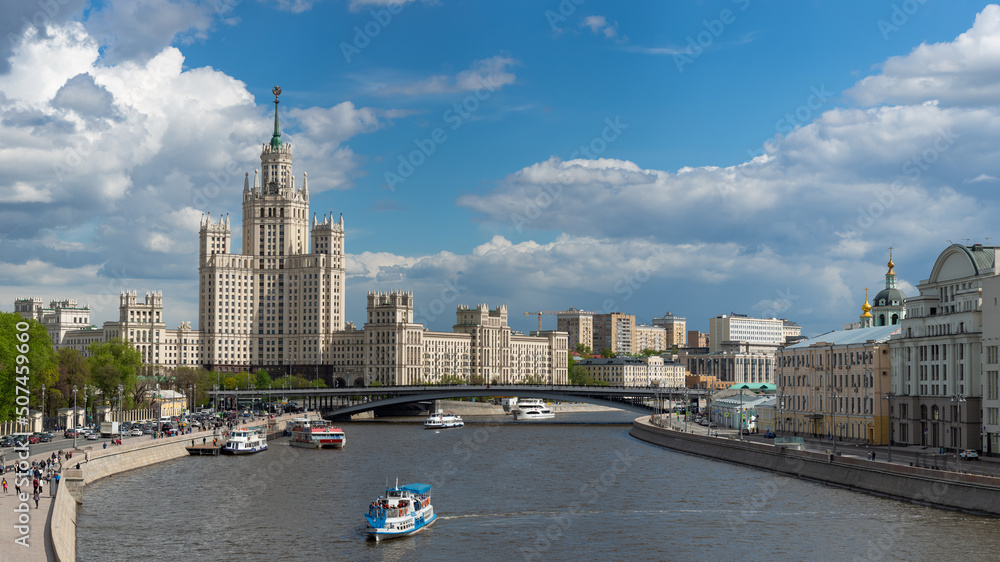 View of the high-rise building from the Moscow river, Kotelnicheskaya embankment. Travel, Russia, Moscow