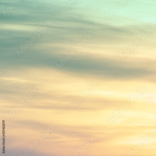 Fototapeta Naklejka Na Ścianę i Meble -  sunset background. sky with soft and blur pastel colored clouds. gradient cloud on the beach resort. nature. sunrise.  peaceful morning. Instagram toned style