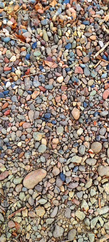 Colorful stone texture. River Stone Background.