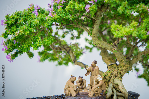 Wallpaper Mural Mini bonsai tree in the flowerpot on bonsai stand a natural background Torontodigital.ca