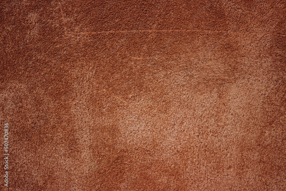 Red rough background. Detail of an old plastered wall. Red rough background. Detail of an old plastered wall.