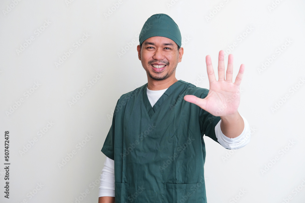 Asian hospital nurse smiling and give five fingers sign