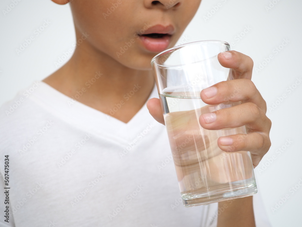 Child drinks water. health concept. closeup photo, blurred. Child drinks water. health concept. closeup photo, blurred.