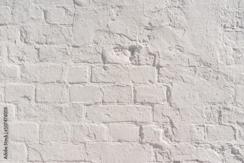 Old white brick wall. Clouseup background.