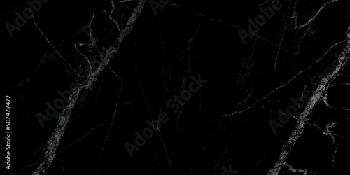 grunge texture background,black marble background with yellow veins © AMK 