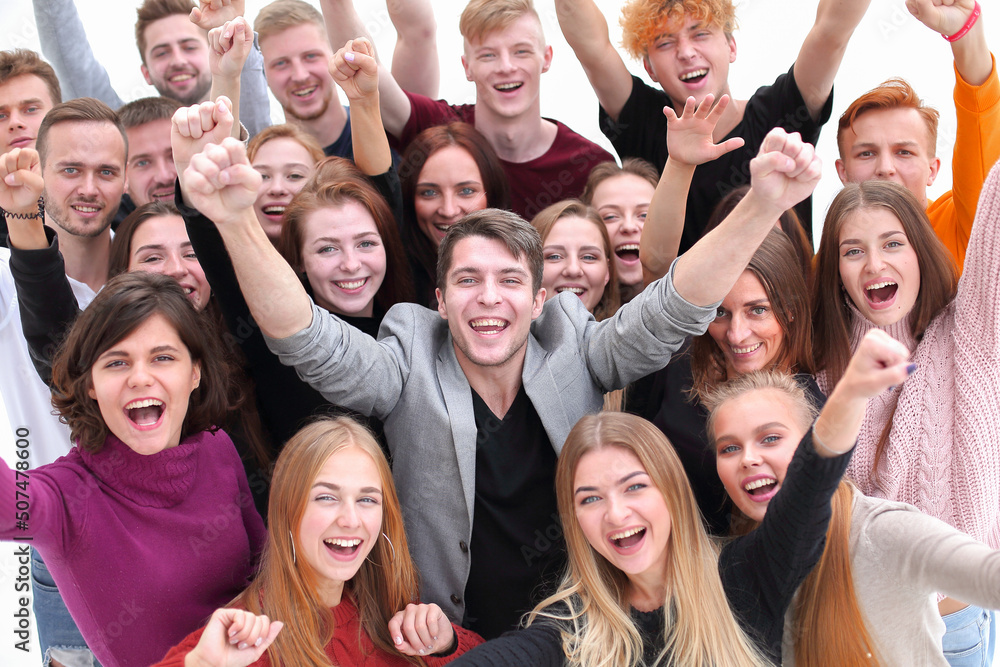 close up. happy young people showing their success close up. happy young people showing their success