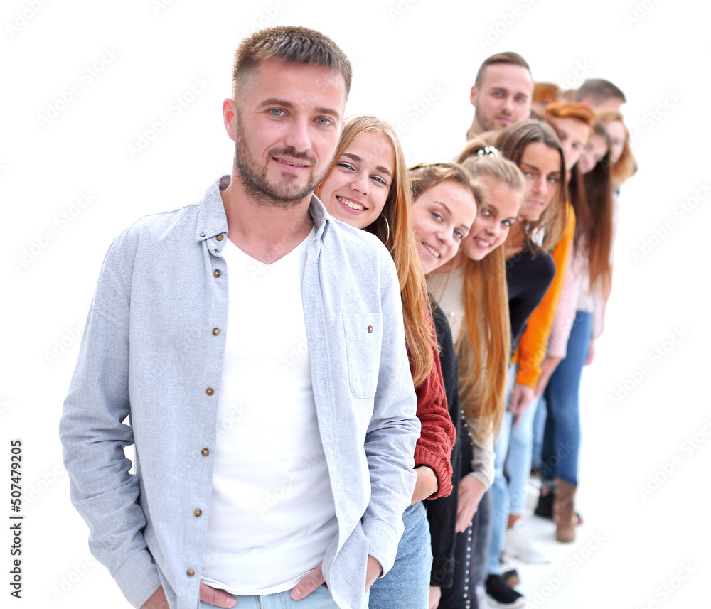 Fototapeta premium handsome guy standing in front of a group of young people