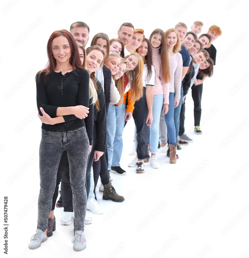 confident guy standing first in the column of young people