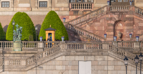 Photography The parterre Logården at the royal castle with stairs and guard a sunny day in S