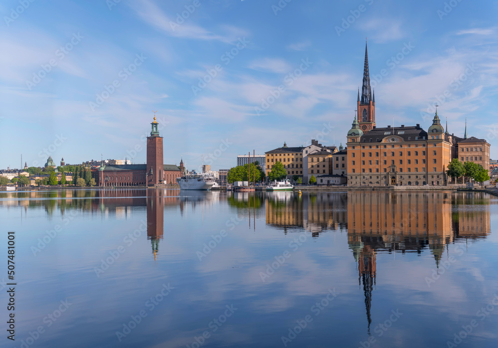 The island Riddarholmen with court houses and the Town City Hall in the background a sunny summer day in Stockholm