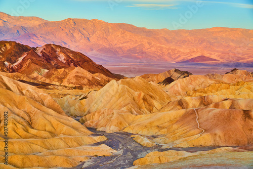 Death Valley stunning sunrise colors in sediment layers of mountains
