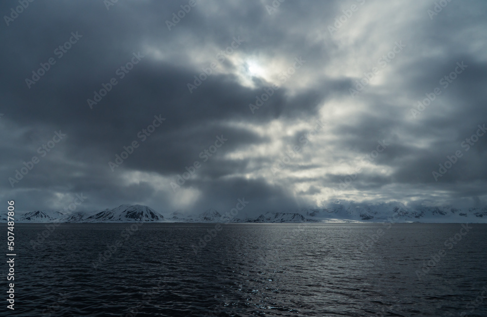 Dramatic arctic landscape in Svalbard. In the foreground the Greenland Sea.