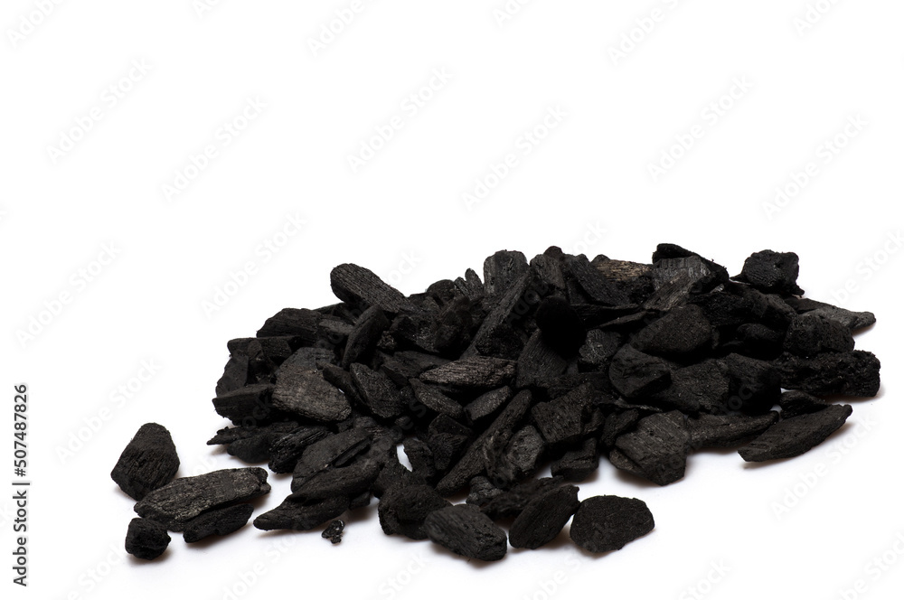 Closeup pile black stones coal white background Closeup pile black stones coal white background