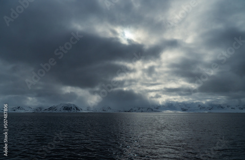 Dramatic arctic landscape in Svalbard. In the foreground the Greenland Sea.
