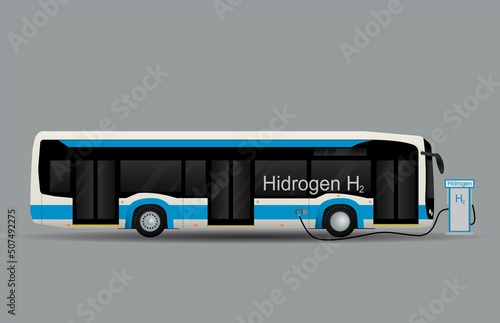 Filling city blue bus with fuel at hydrogen gas station.