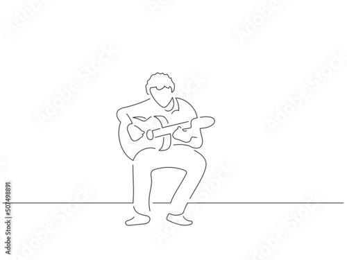 Flamenco guitarist in line art drawing style. Composition of traditional spanish musician. Black linear sketch isolated on white background. Vector illustration design.