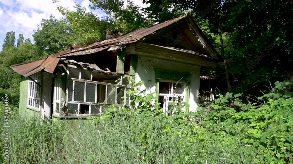Abandoned Ukrainian traditional house in the wilds of Chernobyl. Chernobyl city. Ukraine Abandoned Ukrainian traditional house in the wilds of Chernobyl. Chernobyl city. Ukraine