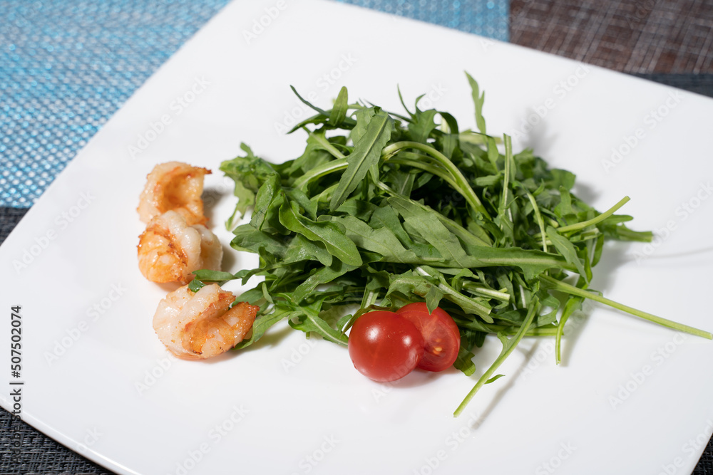 Arugula herb salad with shrimps anв cherry tomato