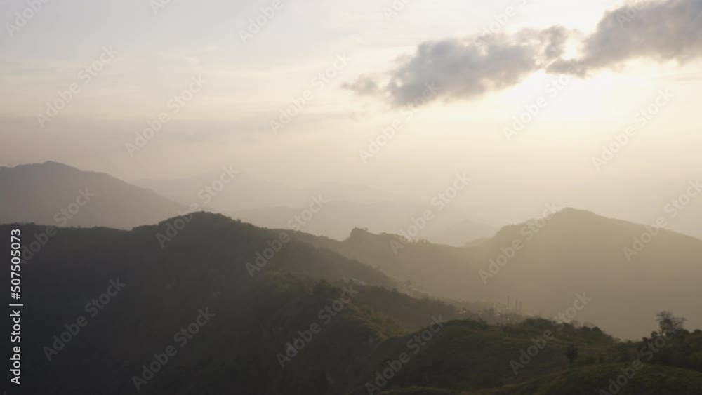 Pan view of Landscape of Mountains at Sunset Pan view of Landscape of Mountains at Sunset