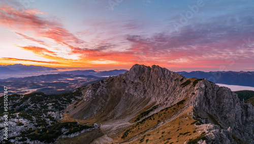 Red and vivid sunrise in the mountains of Julian Alps. 