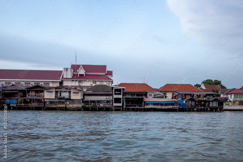 Fototapeta premium Outdoor scenery along riverside of Chao Phraya River in Bangkok, Thailand.