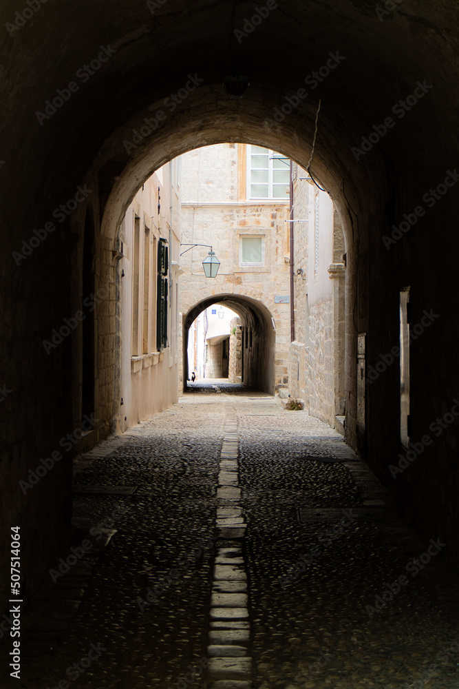 dubrovnik street through one of the old city arches