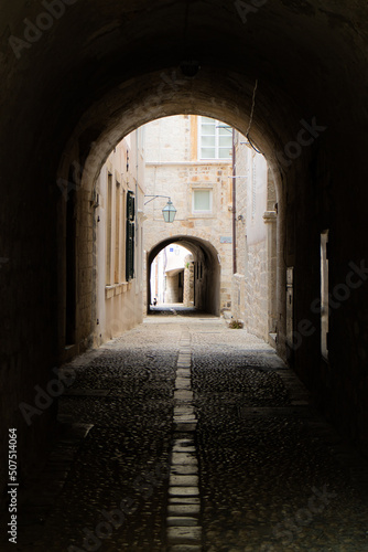 dubrovnik street through one of the old city arches