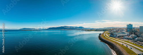 Beautiful aerial view of Reykjavik, Iceland on a sunny summer day. Panoramic view of Reykjavik © Aerial Film Studio