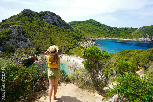 Discovering Greece. Hiker woman enjoying amazing lookout of Porto Timoni on Corfu Island, Greece. photo