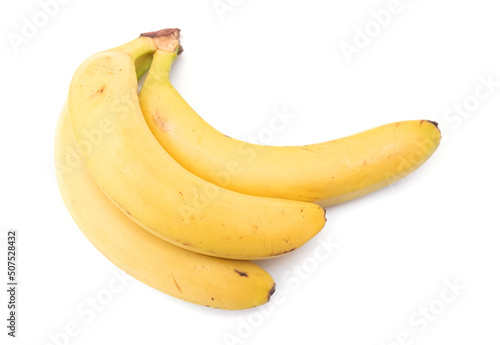 Three ripe yellow bananas on a white background.