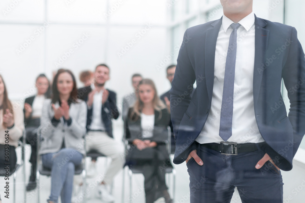 speaker is asking a question during a business seminar.