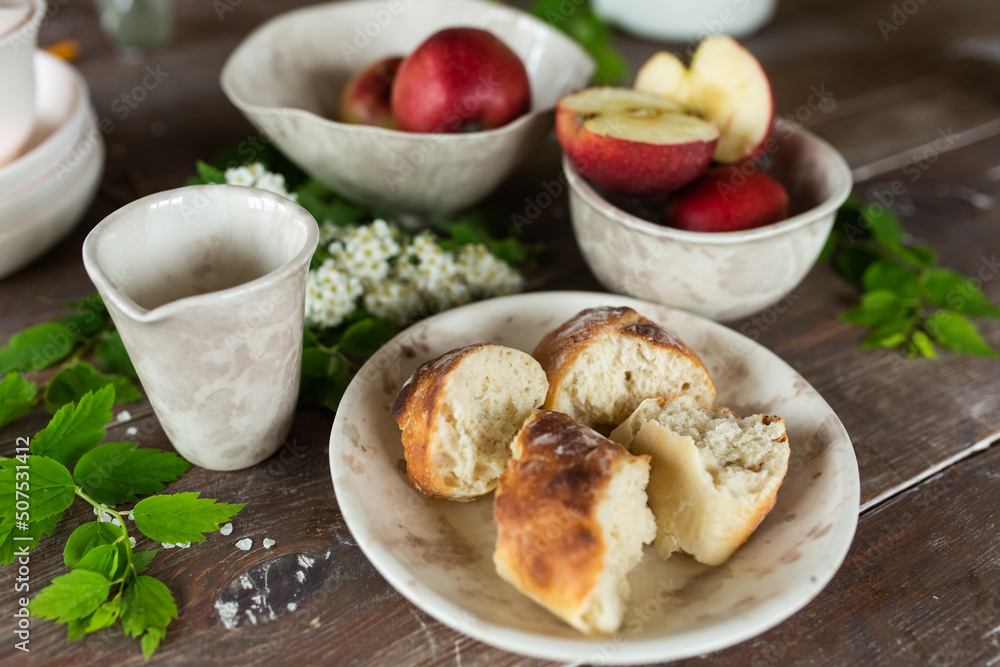 Fresh homemade baguette bread on wooden table. Healthy vegan eco food concept Fresh homemade baguette bread on wooden table. Healthy vegan eco food concept