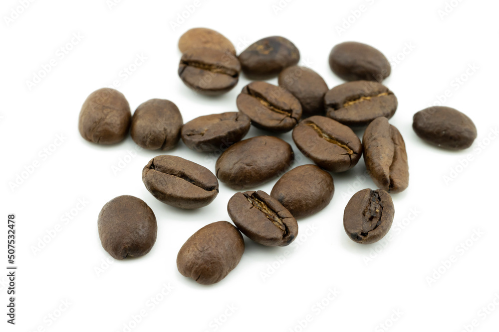 Obraz premium A group of roasted dry brown coffee beans isolated on white background, top view. Beverage with hight caffeine