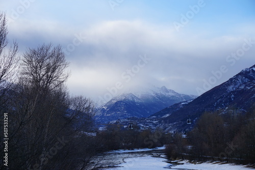 The river in the mountains during winter