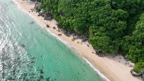 Beautiful white sandy beaches along the southern shoreline of the Bali island, Indonesia