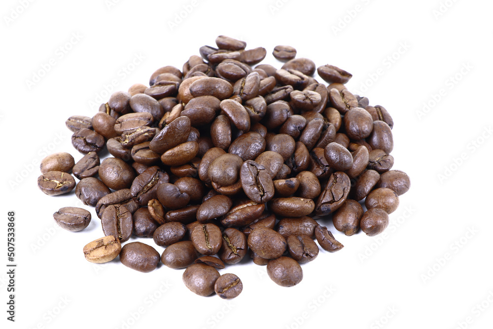 Fototapeta premium Roasted coffee beans isolated.Copy space. Heap of roasted coffee beans