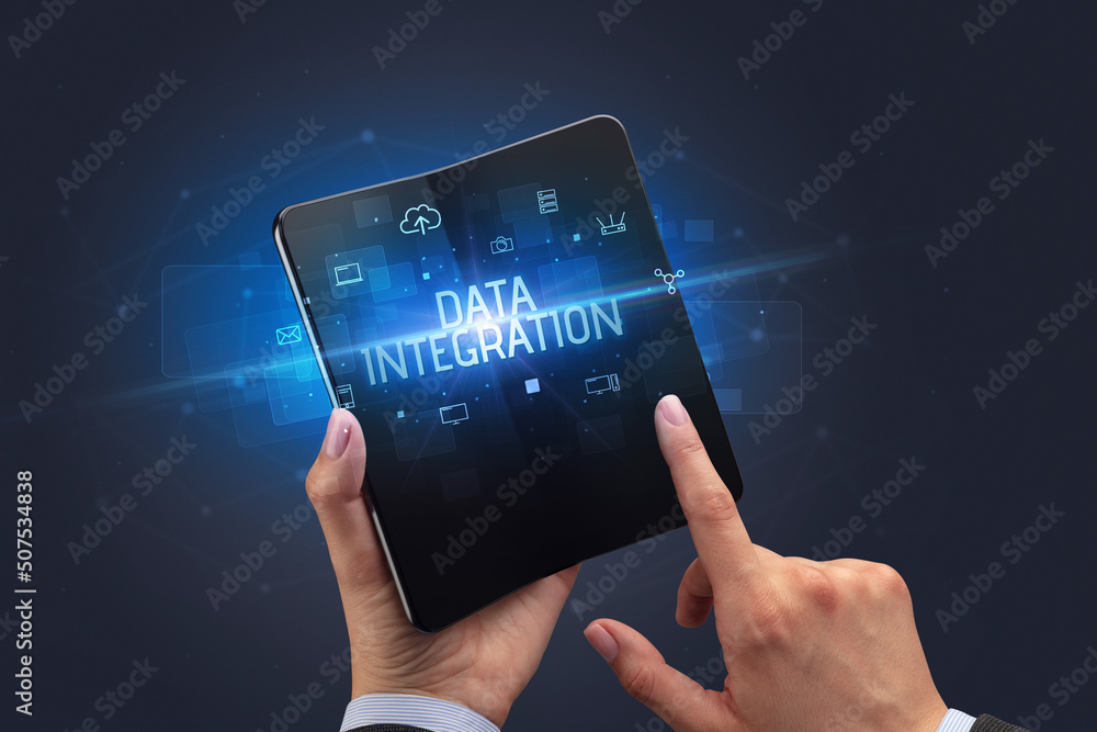 Businessman holding a foldable smartphone, security concept Businessman holding a foldable smartphone, security concept