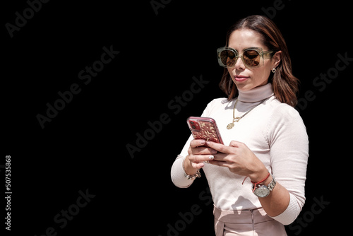 .Casual young woman on black background. advertising space