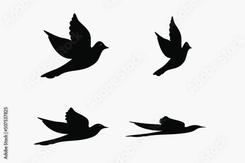 Dove silhouettes , peace symbol. Vector pigeon with spread wings . Holy bird in Christianity, freedom of purity, flight of animal poses isolated © Narek