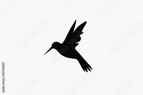 Hummingbird icon. Flat vector illustration in black on white background. Bird flying vector
