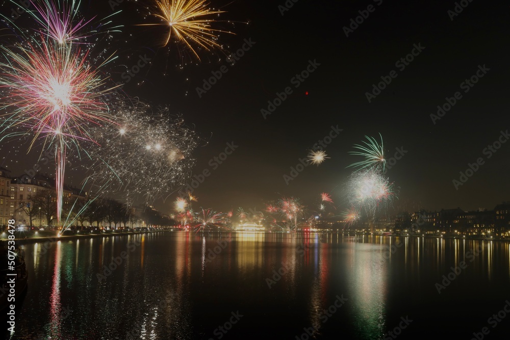 Fototapeta premium fireworks over the river in Copenhagen Denmark 