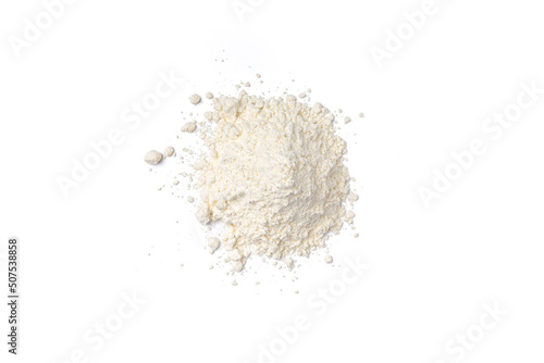 Pile of Powdered Cheddar cheese powder heaped on a white background photo